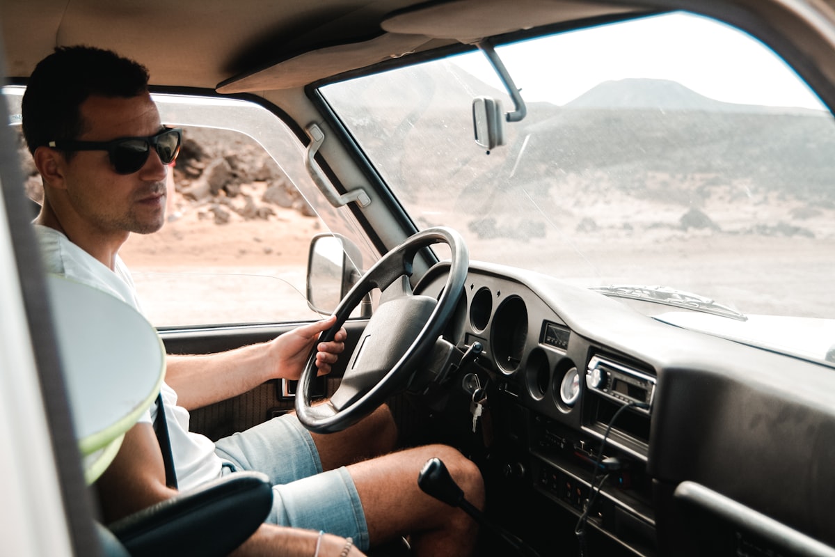 A driver at the wheel of a tractor unit